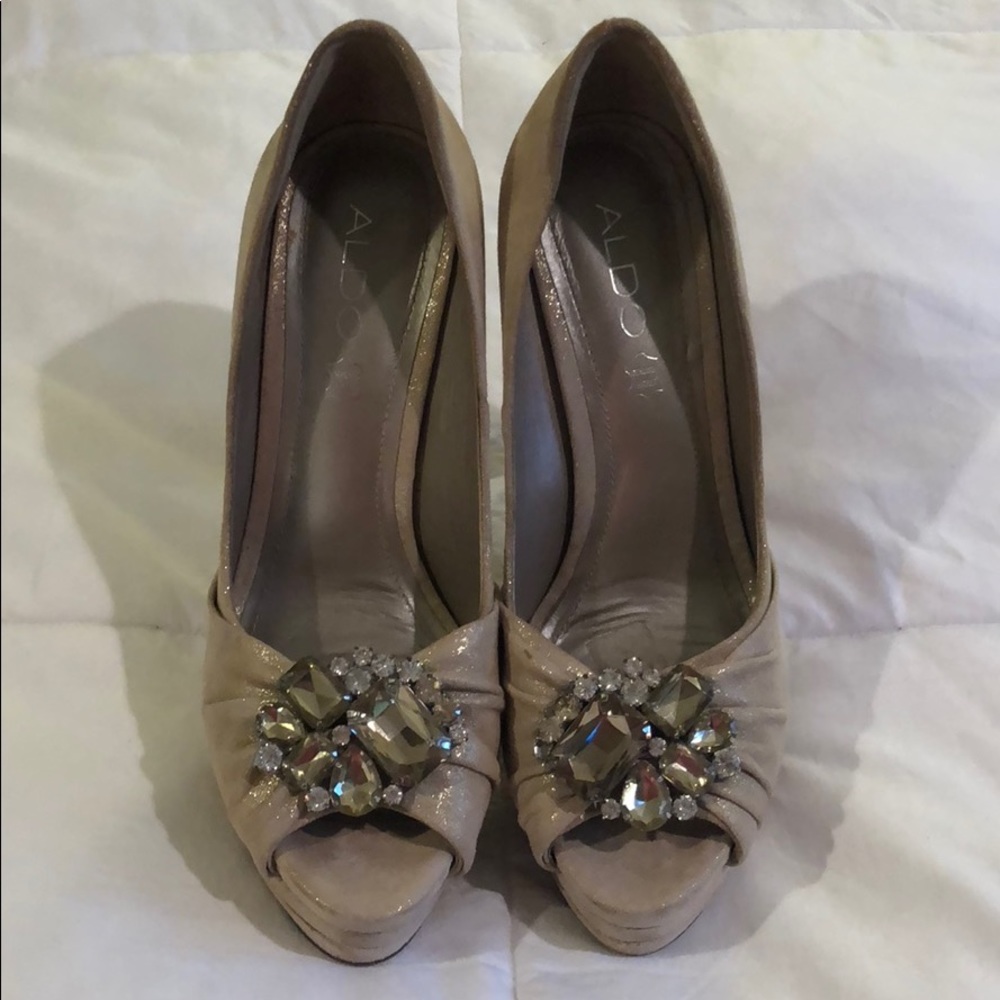 Gold stiletto heels with jewel detail